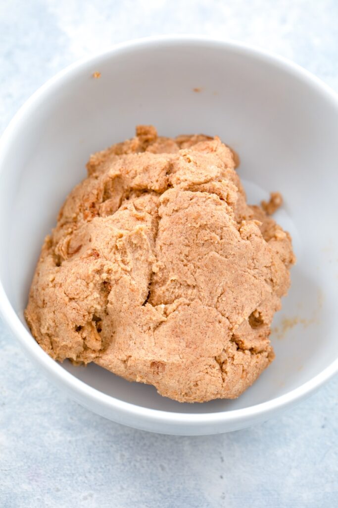 Cinnamon roll dough in small bowl