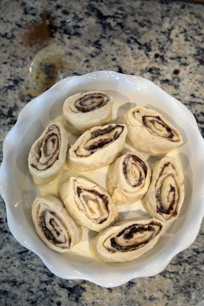 Cinnamon rolls cut and placed in pan before baking