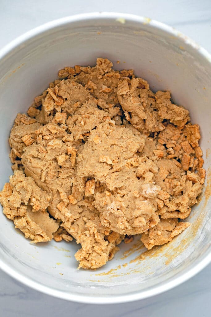 Cinnamon Toast Crunch cookie batter in mixing bowl.