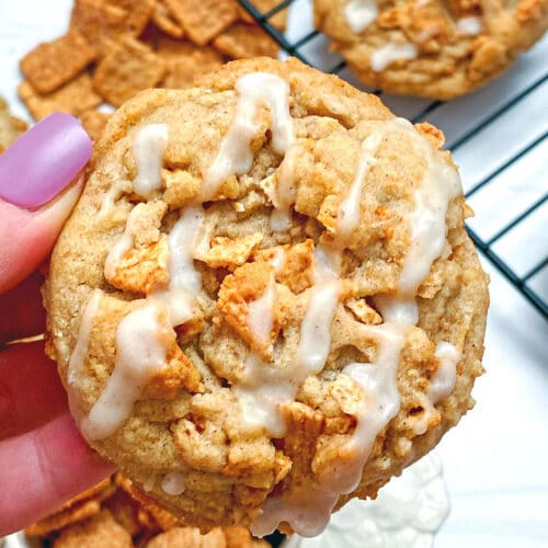 Closeup view of a Cinnamon Toast Crunch cookie with icing drizzle