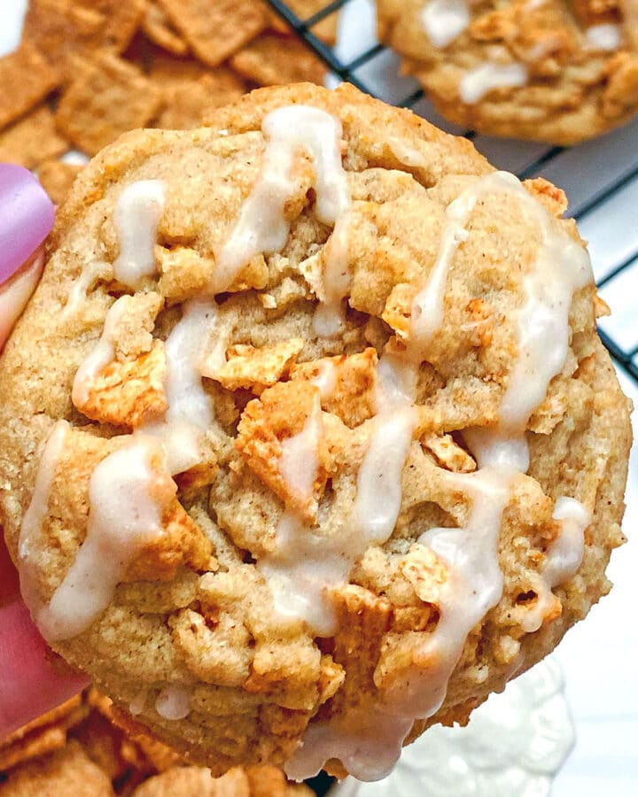 Closeup view of a Cinnamon Toast Crunch cookie with icing drizzle
