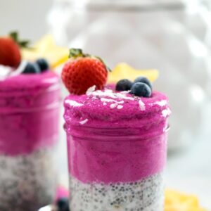 Coconut Chia Dragon Fruit Smoothie Jars -- These 5-ingredient smoothie jars with coconut chia pudding and a banana dragon fruit blend will brighten up your morning with their pretty pink hue and keep you full and satisfied for hours | wearenotmartha.com