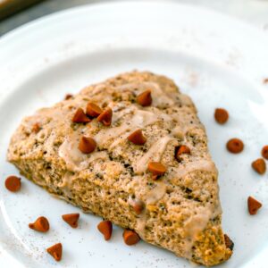 Coffee Cinnamon Scones -- If you think scones are supposed to be dry and boring baked goods, you need to let these Coffee Cinnamon Scones change your mind! Perfectly buttery and packed with coffee, cinnamon, and cinnamon chips, you'll want to start every morning with one of these scones | wearenotmartha.com