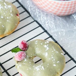 Cranberry Matcha Donuts -- These donuts make the perfect addition to the holiday dessert or brunch table. But they're actually healthier than the average donut and packed with antioxidants from the cranberries and matcha green tea powder | wearenotmartha.com