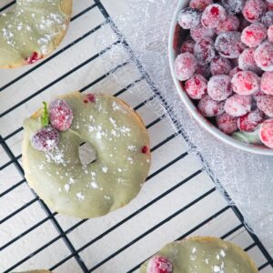 Cranberry Matcha Donuts -- These donuts make the perfect addition to the holiday dessert or brunch table. But they're actually healthier than the average donut and packed with antioxidants from the cranberries and matcha green tea powder | wearenotmartha.com