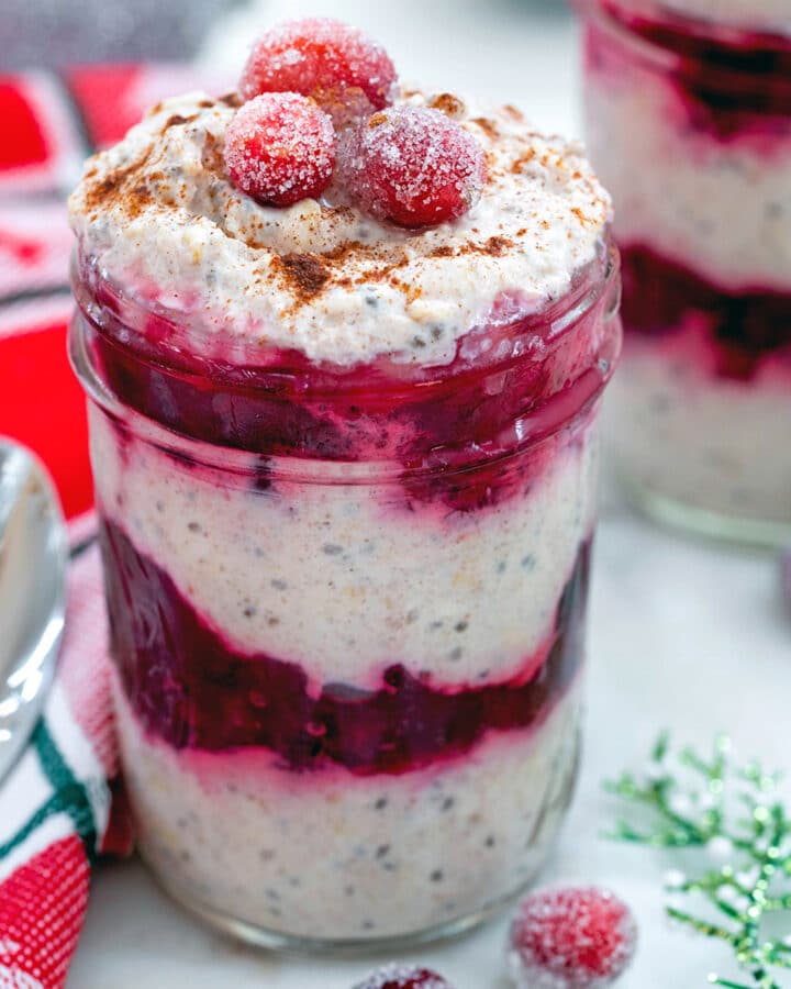 Cranberry Overnight Oats -- Prep these Cranberry Overnight Oats before you go to bed and when you wake up in the morning a deliciously satisfying and festive breakfast will be waiting for you! | wearenotmartha.com #overnightoats #healthybreakfasts #oatmeal #cranberry