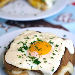 The Croque Madame (AKA grilled ham and cheese sandwich with mornay sauce and egg) is the ultimate breakfast. This Thomas Keller Bouchon version is everything!