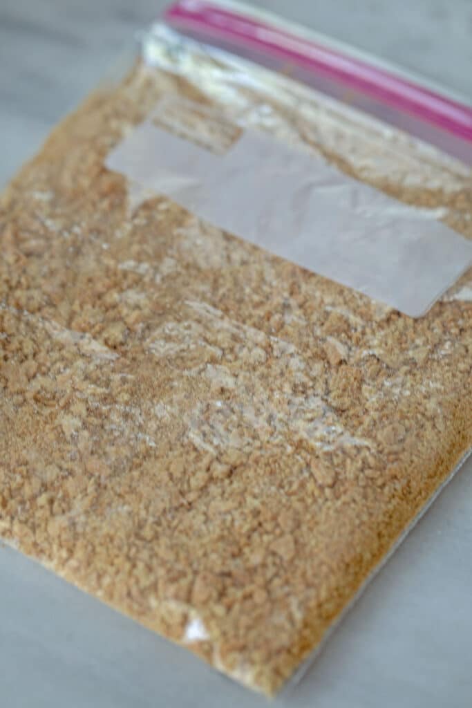Graham crackers crushed in plastic bag.