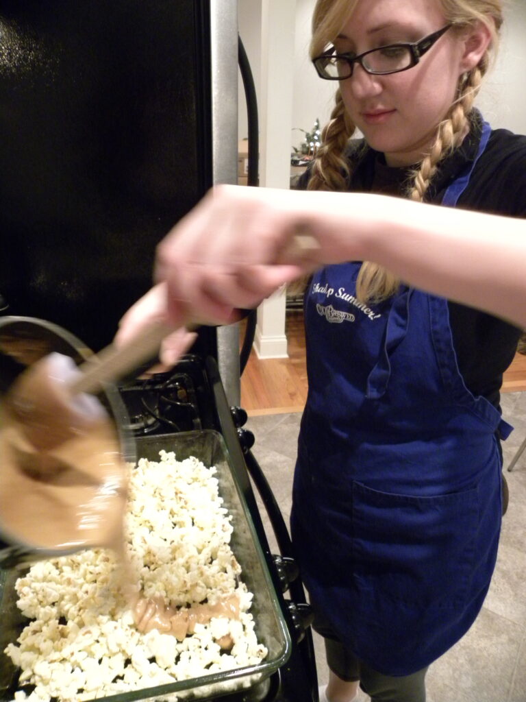 pouring over popcorn