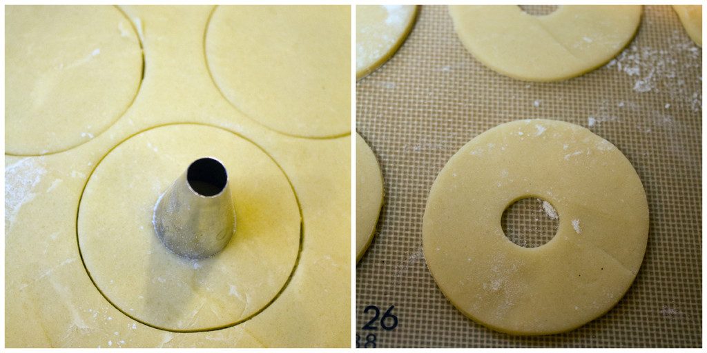 Collage showing sugar cookie dough rolled out with circle cut out and pastry tip placed in center and rounds cut out in dough with smaller circle cut out of center