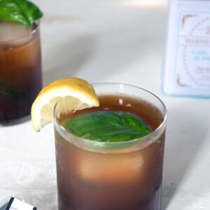 Earl Grey Vodka Cocktail -- This cocktail mixes tea-infused vodka with cranberry juice, lemon juice, and smashed basil for a simultaneously refreshing and warming drink | wearenotmartha.com