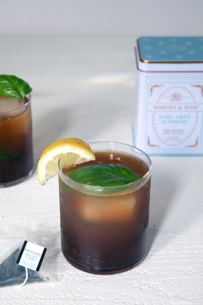 Earl Grey Vodka Cocktail -- This cocktail mixes tea-infused vodka with cranberry juice, lemon juice, and smashed basil for a simultaneously refreshing and warming drink | wearenotmartha.com