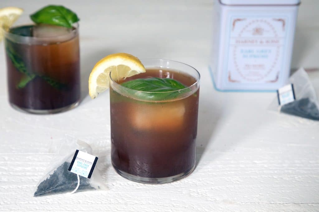 Earl Grey Vodka Cocktail -- This cocktail mixes tea-infused vodka with cranberry juice, lemon juice, and smashed basil for a simultaneously refreshing and warming drink | wearenotmartha.com