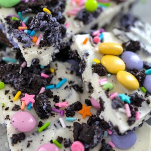 Close-up view of Easter Oreo Bark with M&Ms, white chocolate, and sprinkles