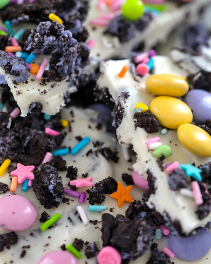 Close-up view of Easter Oreo Bark with M&Ms, white chocolate, and sprinkles