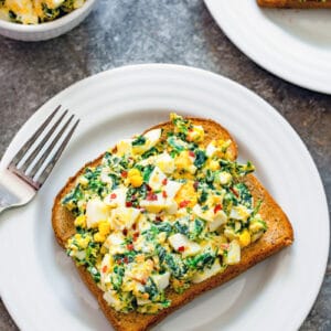 This Egg Salad with Spinach recipe is a little bit healthier thanks to the addition of Greek yogurt and spinach... But it also involves two kinds of cheese for extra deliciousness!