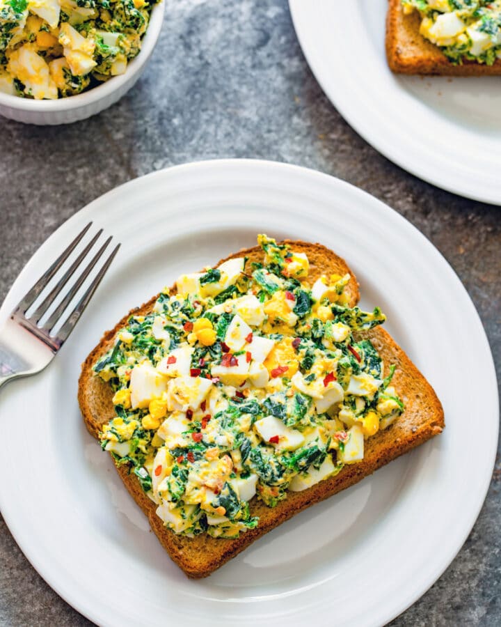 This Egg Salad with Spinach recipe is a little bit healthier thanks to the addition of Greek yogurt and spinach... But it also involves two kinds of cheese for extra deliciousness!