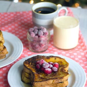 Eggnog French Toast with Sugared Cranberries -- Your holiday breakfast was just decided | wearenotmartha.com