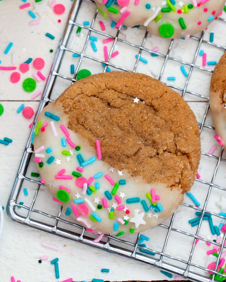 These soft and chewy gingerbread cookies are dipped in an eggnog icing and showered with festive sprinkles. They make for a delicious addition to the Christmas cookie platter, but can be enjoyed all winter long!