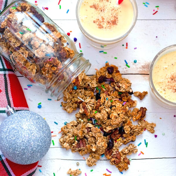 This Eggnog Granola is the perfect way to sneak seasonal drink in at breakfast time! Don't worry; it's packed with heart-healthy grains and nuts and has a light eggnog flavor.