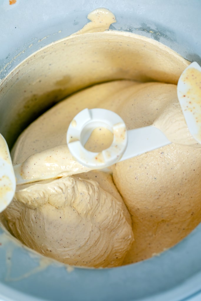 Overhead view of eggnog ice cream processing in an ice cream maker