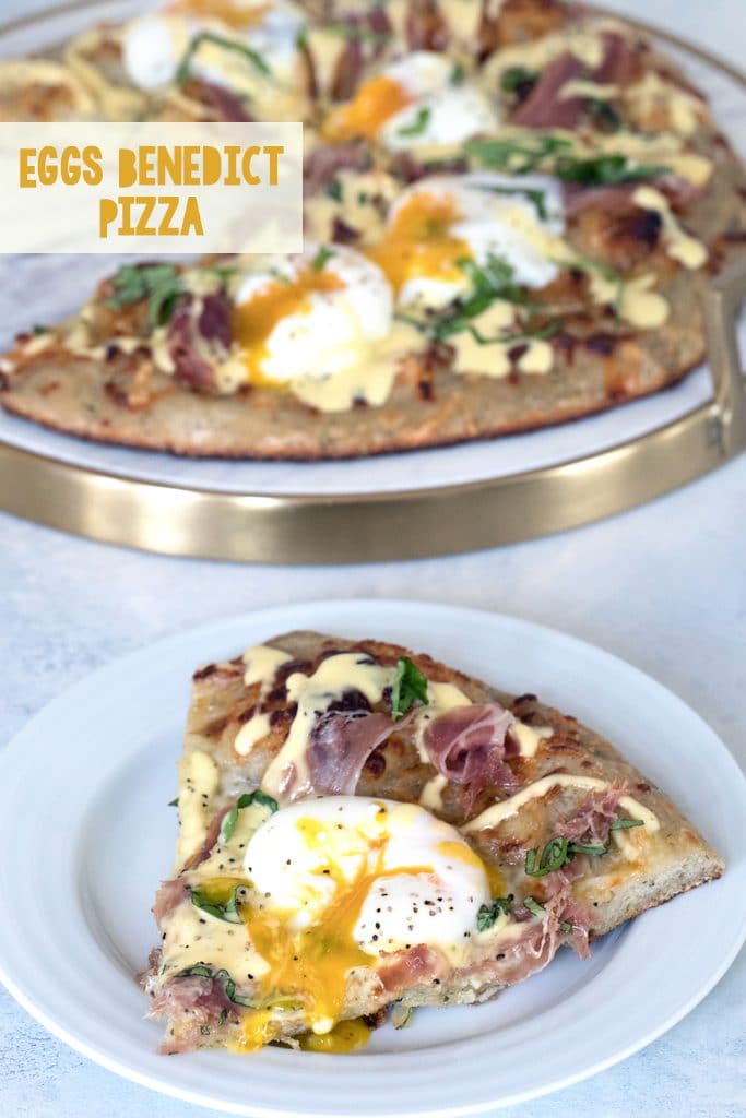 Overhead view of a slice of eggs benedict pizza with runny egg on a white plate with rest of brunch pizza in background and recipe title at top