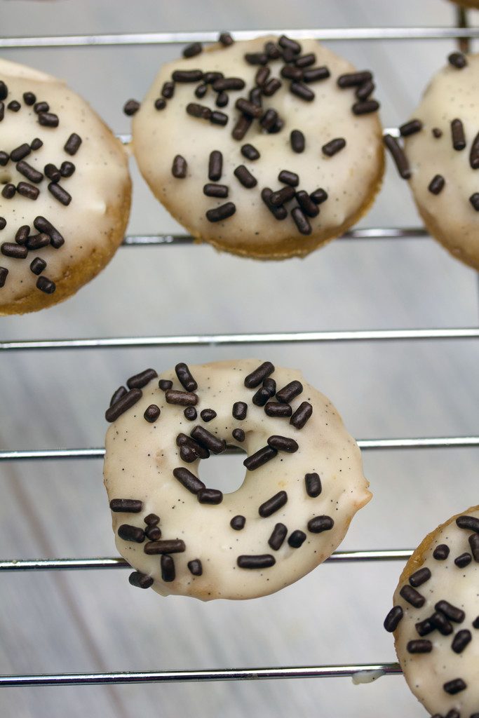 Espresso Doughnuts with Vanilla Sweet Cream Icing -- Mini doughnuts that taste like the Starbucks drink! | wearenotmartha.com