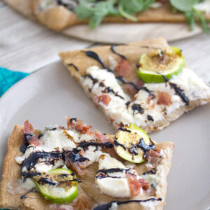 Fig, Prosciutto, and Ricotta Flatbread -- Don't let summer pass by without taking advantage of fresh figs. This Fig, Prosciutto, and Ricotta Flatbread is packed with flavor and is the perfect combination of salty and sweet | wearenotmartha.com