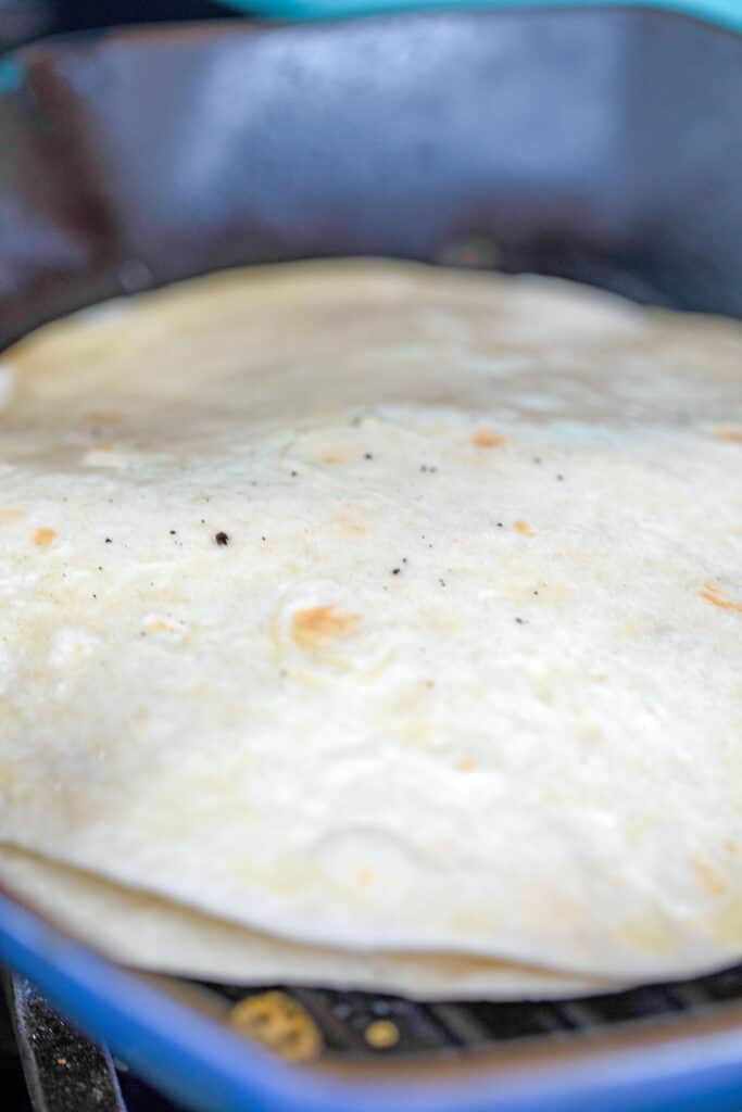 Quesadillas being grilled in pan