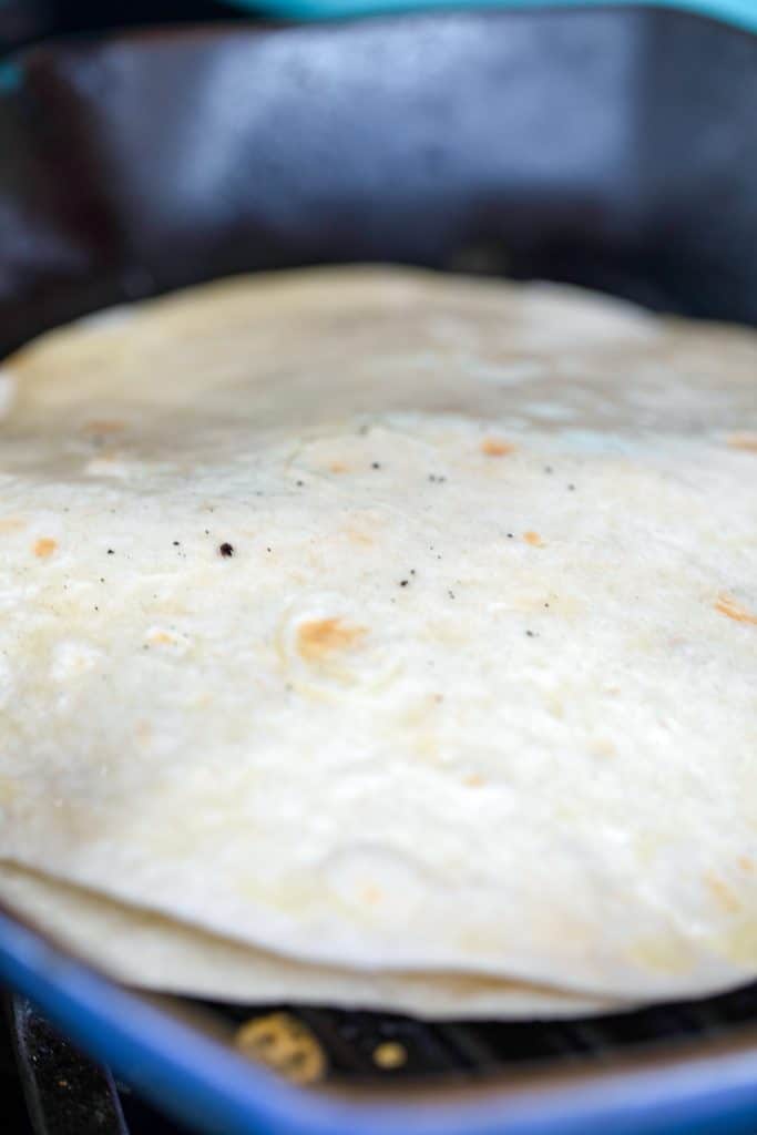 Quesadillas being grilled in pan