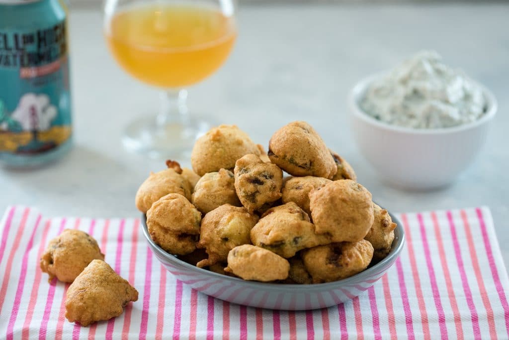 Beer Batter Fried Brussels Sprouts -- No matter your feelings on brussels sprouts, it's impossible not to love these Beer Batter Fried Brussels Sprouts. Served with a blue cheese yogurt dip, you won't be able to stop eating these sprouts | wearenotmartha.com