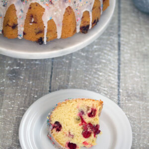 Frosted Vanilla Cookie Cranberry Bundt Cake -- A classic holiday cake with a sweet twist | wearenotmartha.com