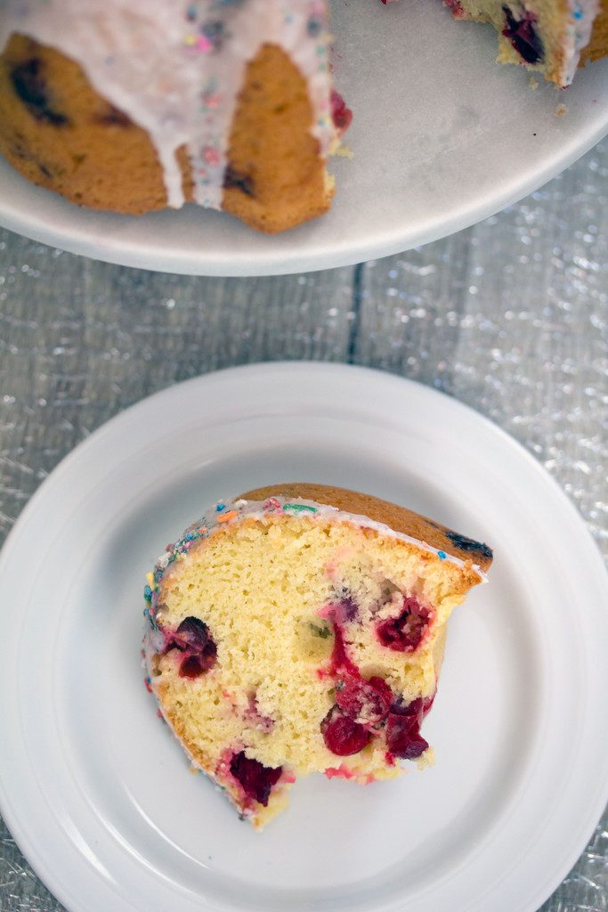 Frosted Vanilla  Cookie Cranberry Bundt Cake -- A classic holiday cake with a sweet twist | wearenotmartha.com