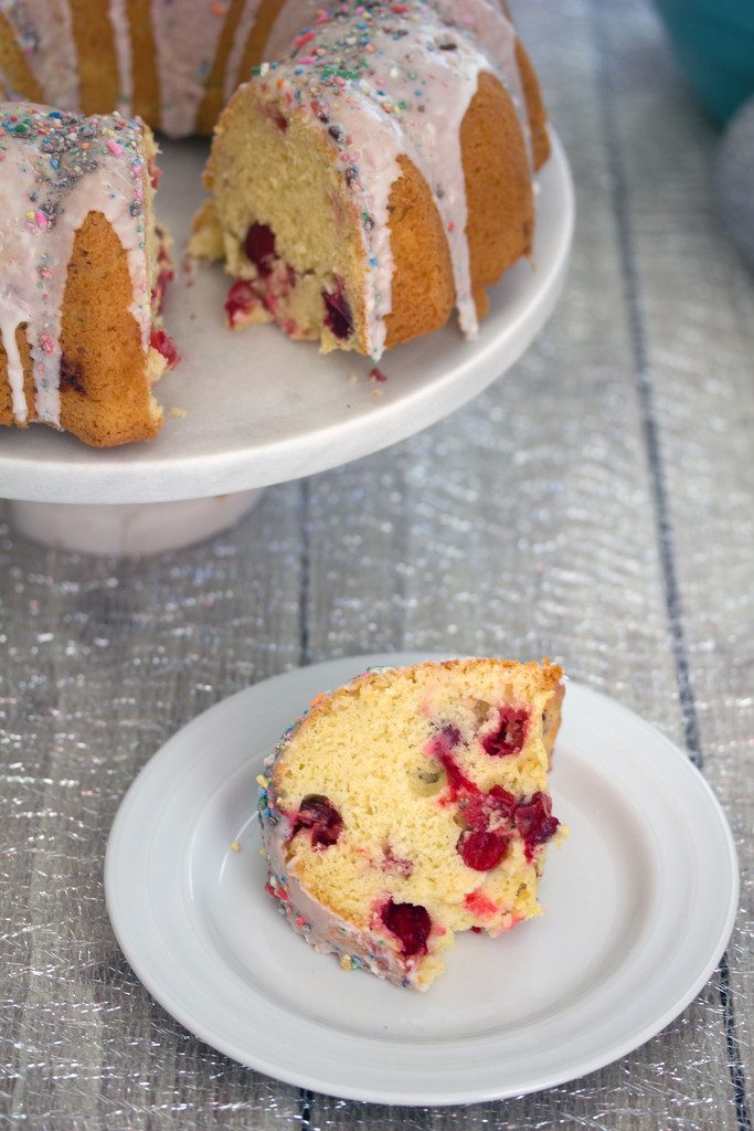 Frosted Vanilla  Cookie Cranberry Bundt Cake -- A classic holiday cake with a sweet twist | wearenotmartha.com
