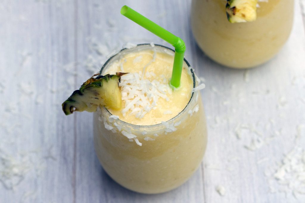 Frozen Pineapple Coconut Margarita -- A frosty summer cocktail with tequila | wearenotmartha.com
