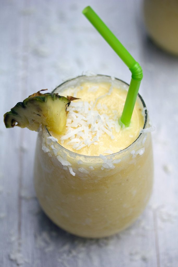 Frozen Pineapple Coconut Margarita -- A frosty summer cocktail with tequila | wearenotmartha.com