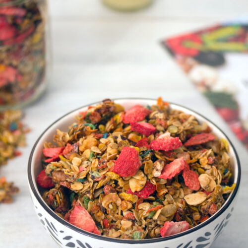 Fruity Granola -- This granola made with Fruity Pebbles and freeze-dried strawberries makes the perfect hostess gift! | wearenotmartha.com