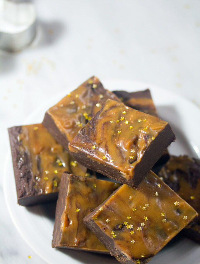 Gingerbread Chocolate Caramel Fudge -- Fudge doesn't have to be difficult! This easy-to-make Gingerbread Fudge also involves lots of chocolate and caramel and makes the perfect holiday dessert or edible gift! | wearenotmartha.com