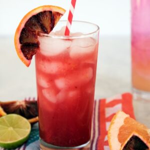 Grapefruit Blood Orange Cocktail -- Winter citrus fruits make this a stunningly colorful and delicious drink. It's both refreshing and warming at the same time | wearenotmartha.com