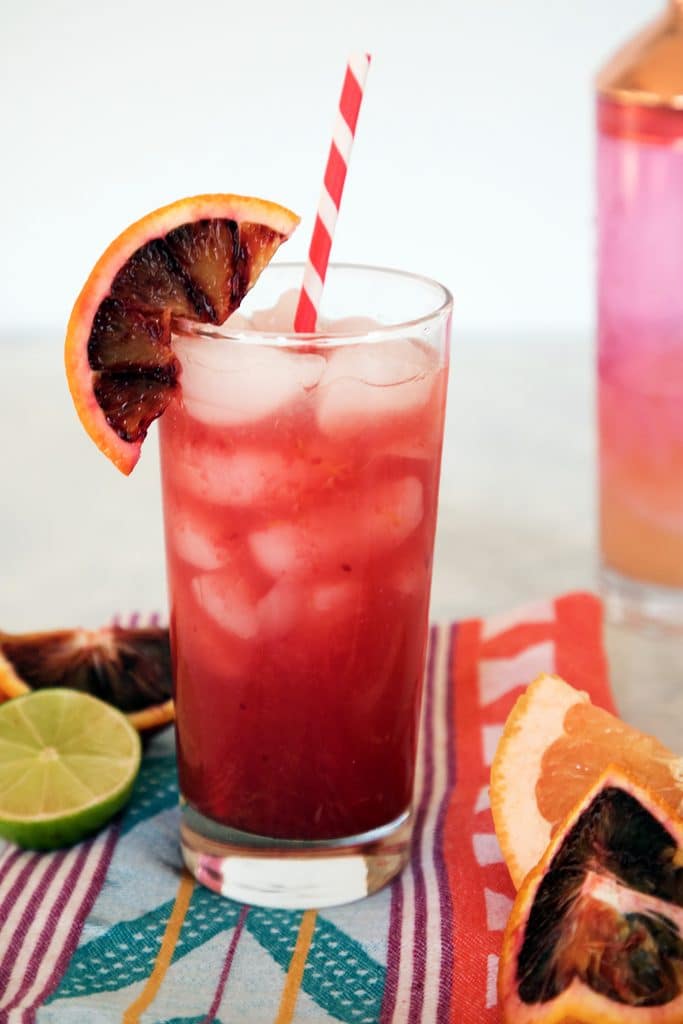 Grapefruit Blood Orange Cocktail -- Winter citrus fruits make this a stunningly colorful and delicious drink. It's both refreshing and warming at the same time | wearenotmartha.com