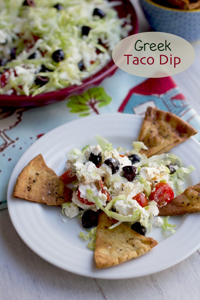 Greek Taco Dip with Black Peppercorn Pita Chips -- The perfect alternative to a party taco dip | wearenotmartha.com