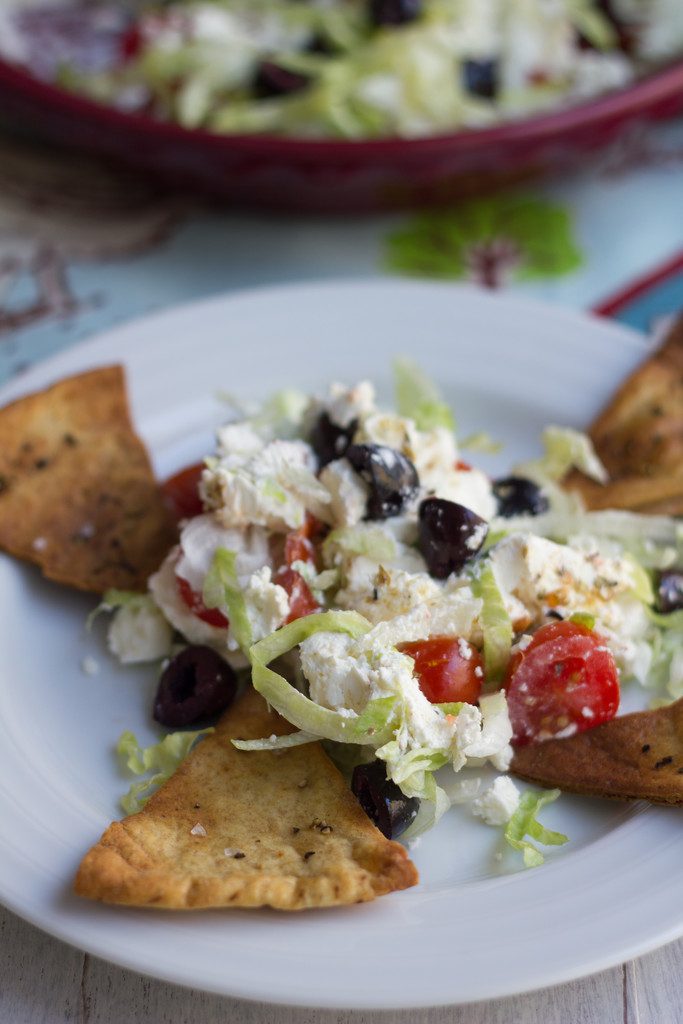 Greek Taco Dip with Black Peppercorn Pita Chips -- The perfect alternative to a party taco dip | wearenotmartha.com