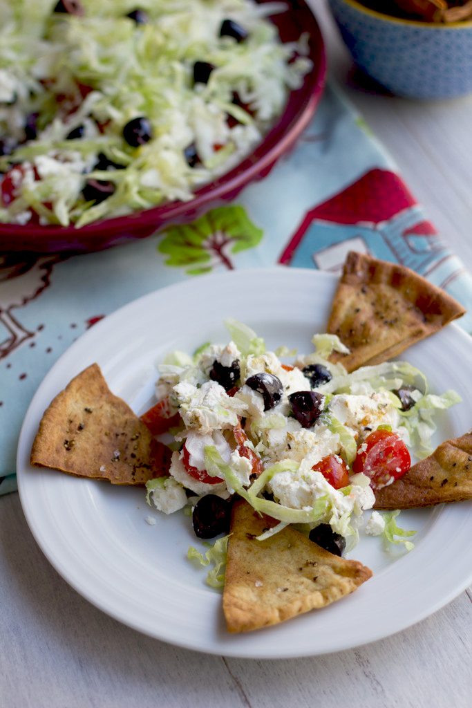 Greek Taco Dip with Black Peppercorn Pita Chips -- The perfect alternative to a party taco dip | wearenotmartha.com