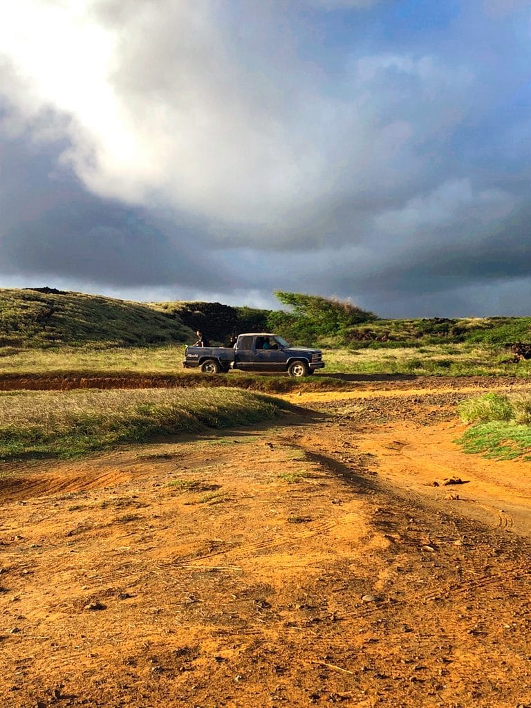 A pickup truck carrying passengers on the hike to Papakolea, the Green Sand Beach in Kona on the Big Island of Hawaii