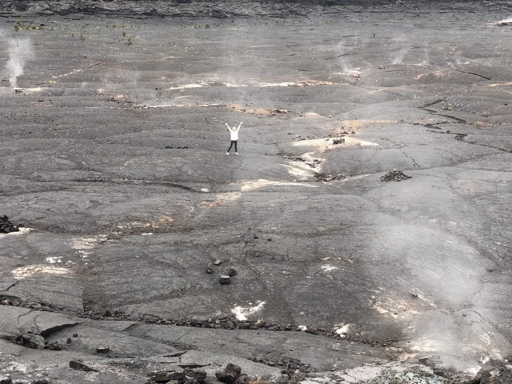 Sues posing on the crater while hiking the Kīlauea Iki Trail at Volcano National Park on the Big Island of Hawaii