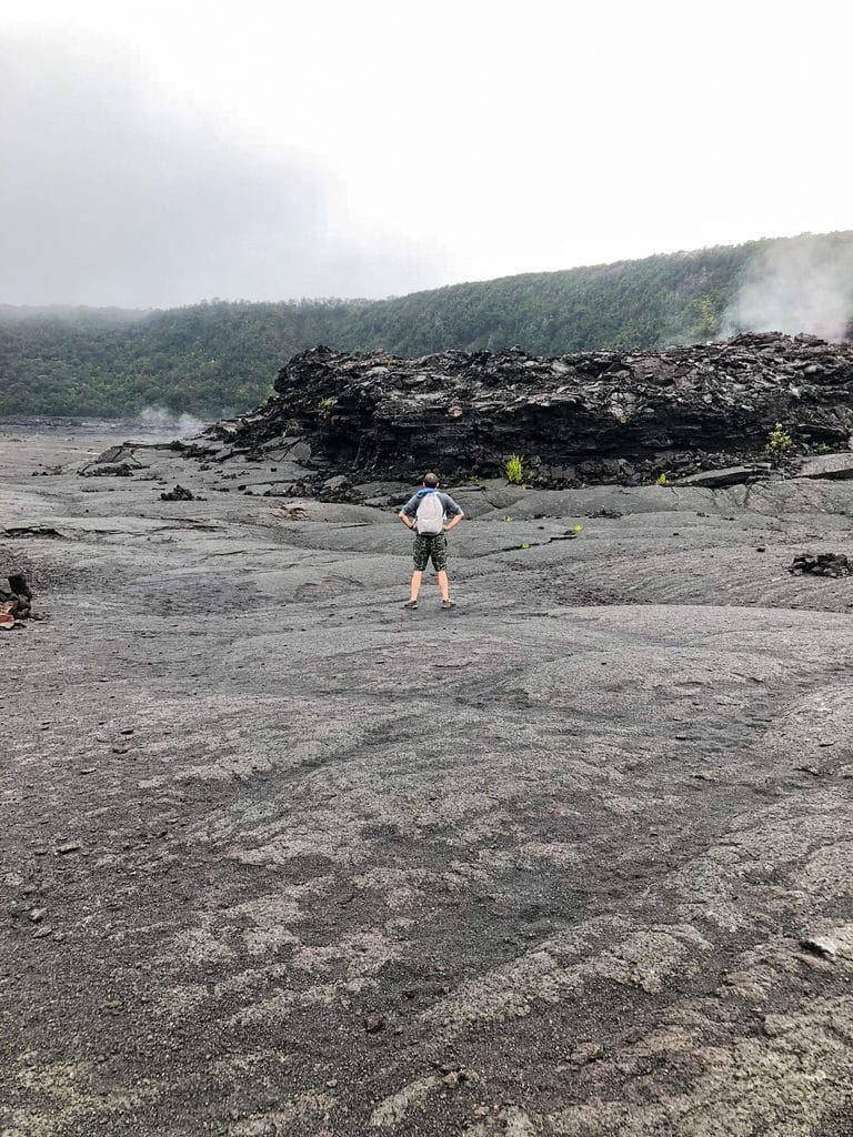 Chris watching the sulphur on the crater while hiking the Kīlauea Iki Trail at Volcano National Park on the Big Island of Hawaii