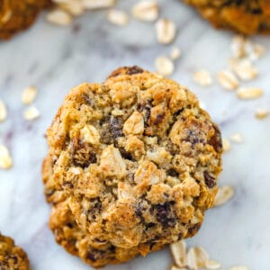 Healthy Chocolate Chip Oatmeal Cookies -- These Healthy Chocolate Chip Oatmeal Cookies are packed with oats, whole wheat flour, dark chocolate, and dates and are some of the most delicious cookies I've ever had! | wearenotmartha.com
