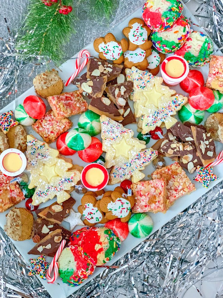 How to Arrange the Perfect Holiday Cookie Platter -- 'Tis the season for holiday cookies! But instead of just throwing them on a plate before your holiday party, use these tips for how to arrange the perfect holiday cookie platter (hint: always serve with eggnog!)| wearenotmartha.com