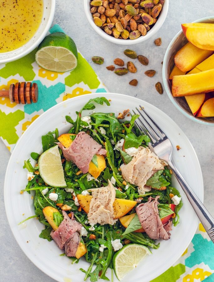 Honey Lime Peach Salad with Roast Beef and Turkey -- For those summer nights when it's too hot to cook, but you're not willing to sacrifice taste, try this summer peach salad. You can prep it in minutes and the result is a light and refreshing summer salad packed with protein.... No oven necessary | wearenotmartha.com