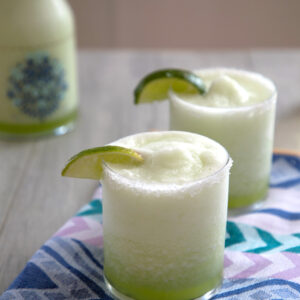 Honeydew Ginger Frozen Margarita -- This unique frozen cocktail is perfect for any time of year! | wearenotmartha.com